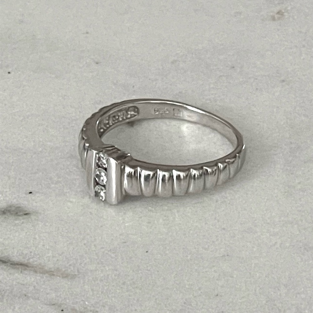 Elegant Silver Ring with Diamond Accents